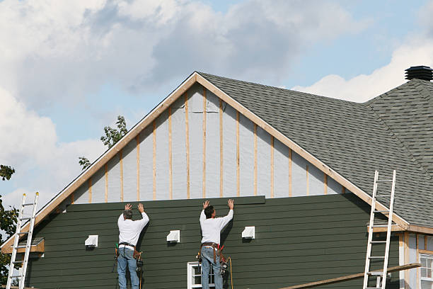 Professional Siding technician working in Adamsburg, PA